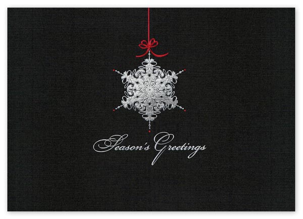 A single, lacey star dangles against the black night in the elegantly poignant Starlight Star Bright holiday card.