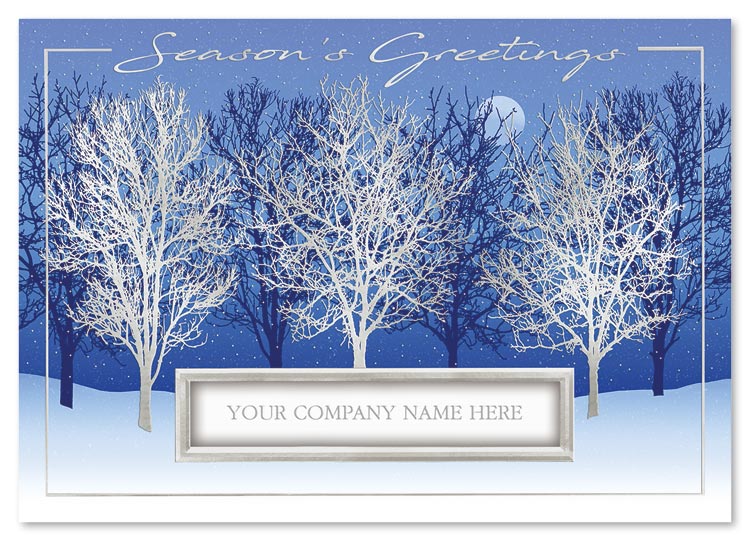 A wintry grove stands guard on a moonlit night in the Silver Moon Holiday Card.