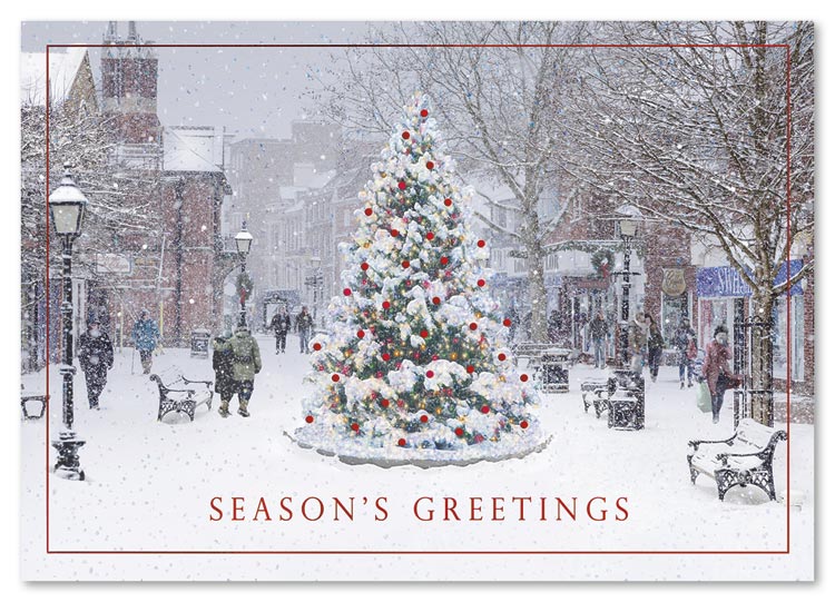 Sparkling, fresh-falling snow brings extra magic to a classic holiday scene on the In the Square Holiday Card.